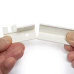 Set of rear hooks for drawer rails